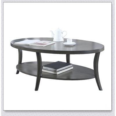 Table basse à tablette ovale contemporaine avec beaucoup d'espace de présentation et rangement supplémentaire, finition grise chic pour le décor de n'importe quelle pièce.