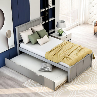 Lit plateforme gris avec lit gigogne maniable - construction portative en bois massif