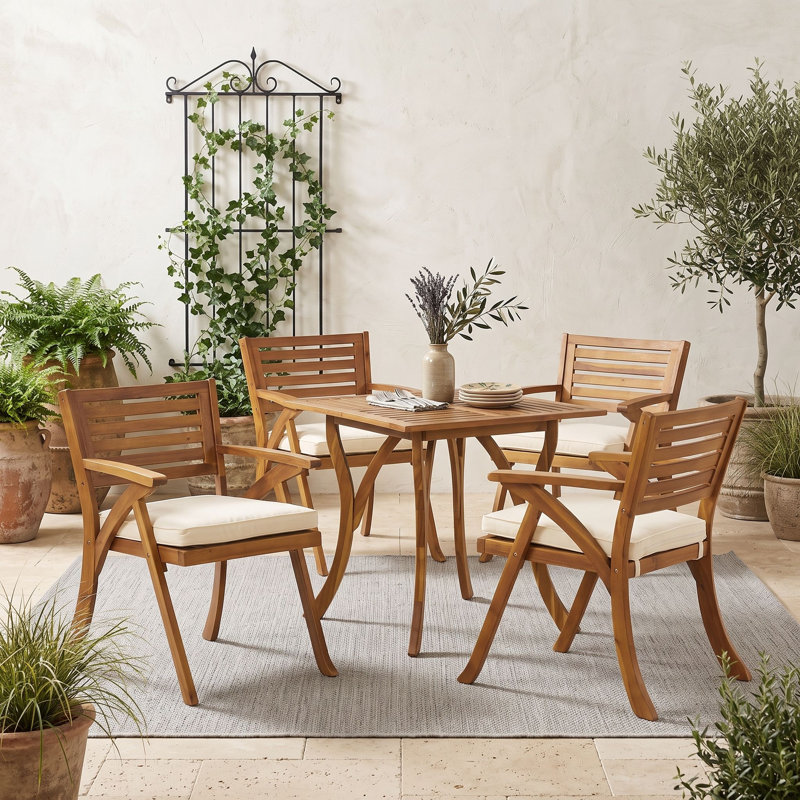 Ensemble de salle à manger 5 pièces en bois d'acacia avec quatre fauteuils rembourrés résistants à l'eau et une table à plateau à lattes