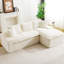 Chaise longue en velours blanc tortue, formes modulables, différentes fonctions, idéale pour recevoir, confort optimal, positions assises en L et droites pour des moments de détente.