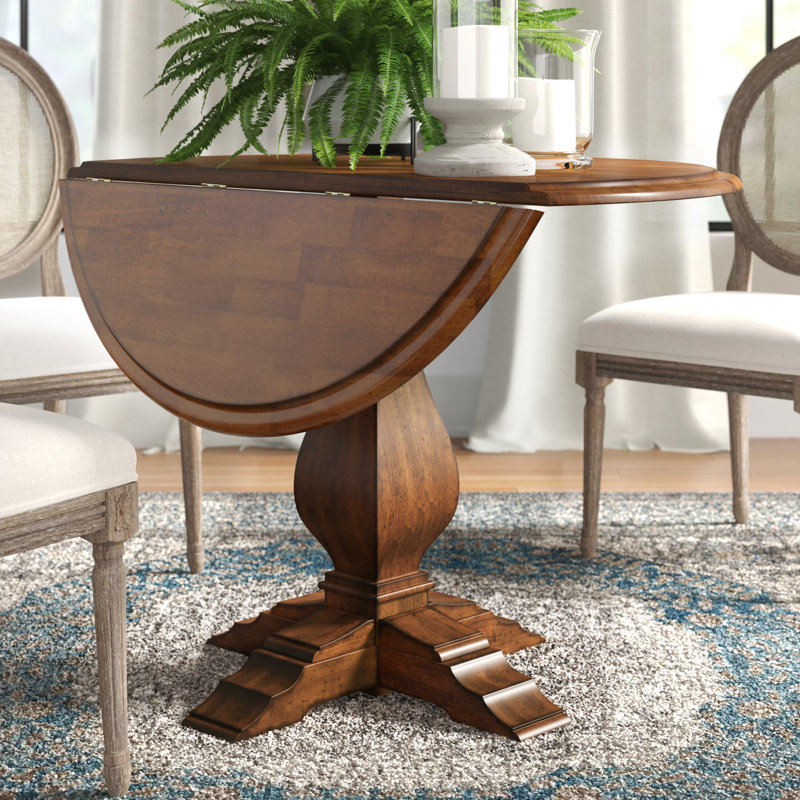 Knaack Extendable Round Solid Wood Dining Table