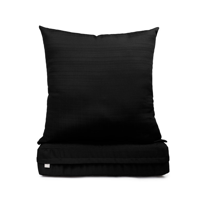 Coussin de siège avec fermeture à glissière et coussin de dossier séparé, avec rembourrage en polyester blanc.