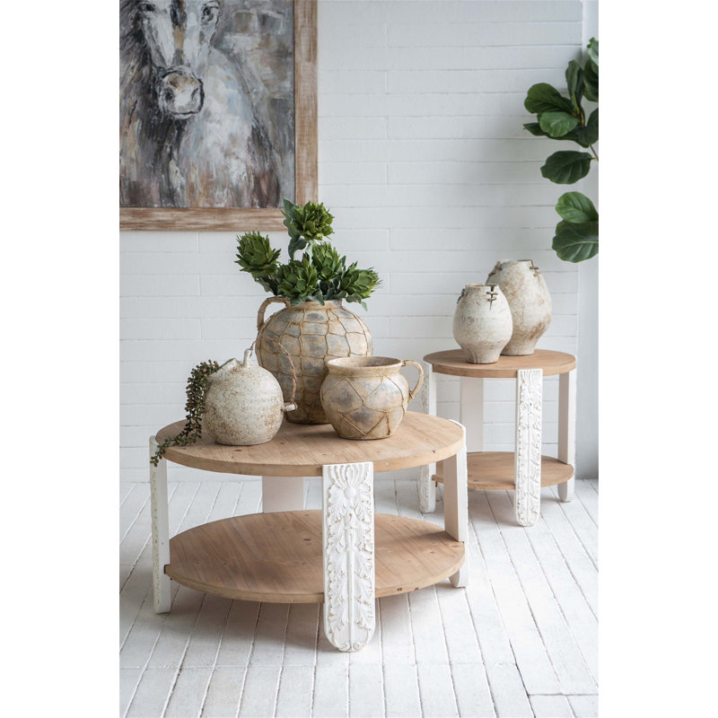 Table basse ronde en bois avec pieds sculptés et tablette de rangement inférieure pour une meilleure organisation