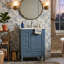 Meuble-lavabo autoportant moderne de 24 po avec comptoir en céramique intégré, armoire de rangement simple à pieds en bois massif avec 3 tiroirs à fermeture en douceur, porte d'armoire et support de rangement intégré, montage sur robinet central (offert en blanc et bleu)-129699120