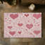 Tapis tressé à motif de cœurs roses-106464286