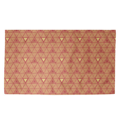 Tapis à motifs de triangles oranges