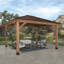 Abri de jardin extérieur en bois de cèdre 14 pi x 12 pi avec toit rigide en acier galvanisé et PowerPort Backyard Discovery Barrington