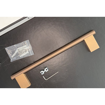Tomo brushed bronze small towel bar 13 inches.