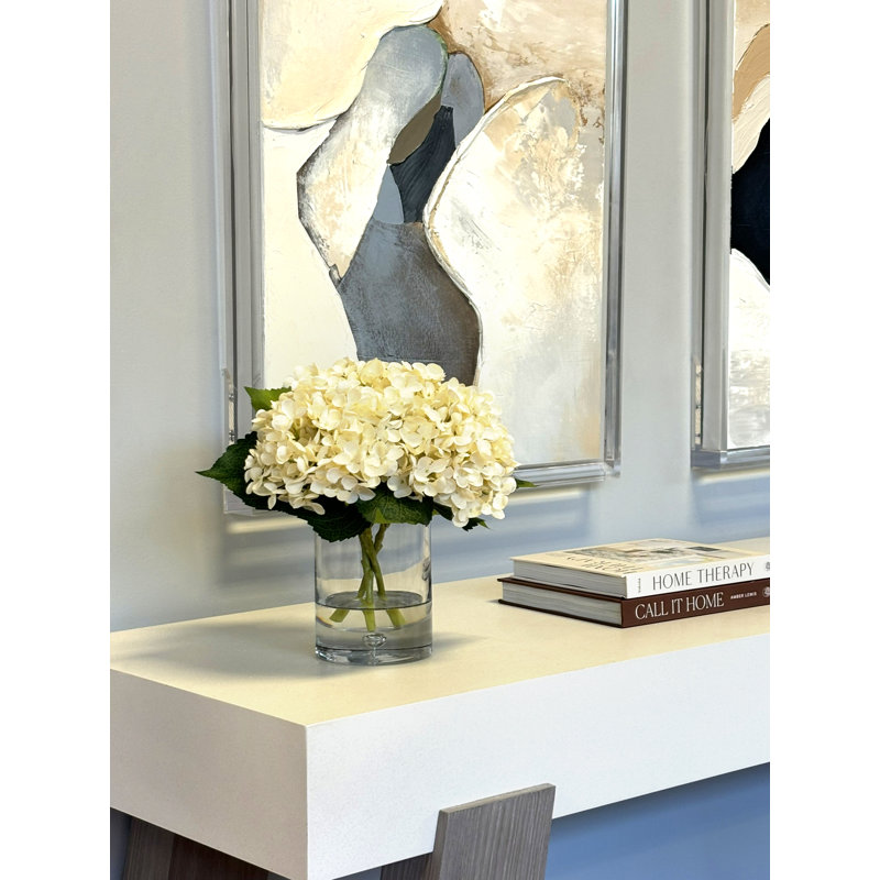 Hydrangea Arrangement In A Clear Glass Vase