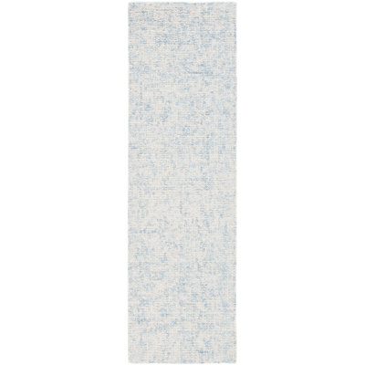 Nistor Abstract Wool Hand Tufted Area Rug