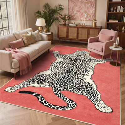 Tapis rouge / beige / noir à motif animalier Alinda