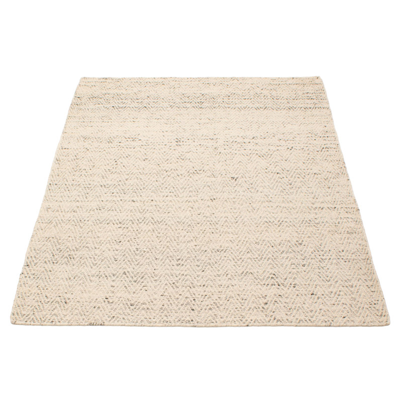 Confort moelleux avec un look et une texture artisanaux. Les fils doux et lustrés sont tissés à la main pour créer un éventail de textures, y compris des boucles surdimensionnées et des surfaces planes riches en dimensions.