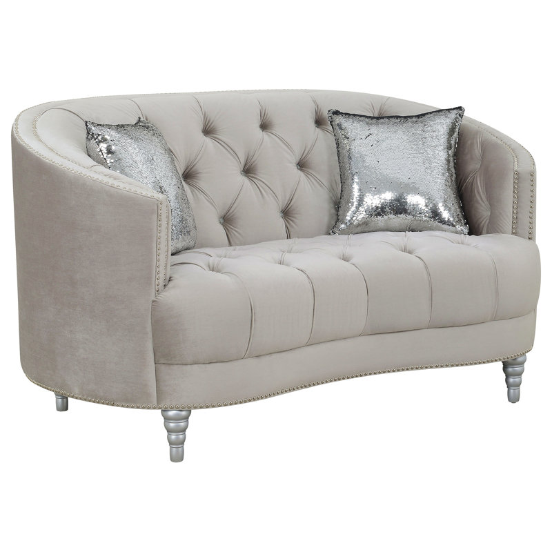 Causeuse grise grise contemporaine avec capitonnage