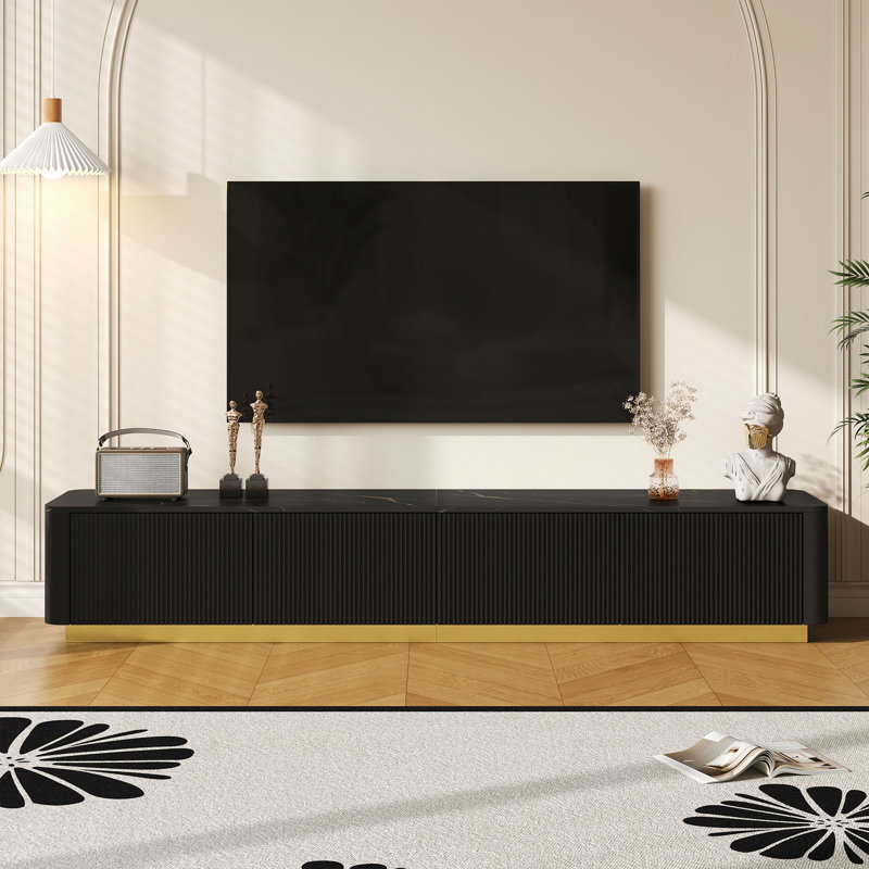 Meuble télé de luxe cannelé pour téléviseur de 85 po ou moins, console multimédia en faux marbre avec 4 tiroirs, centre de divertissement à profil courbé avec base dorée pour le salon