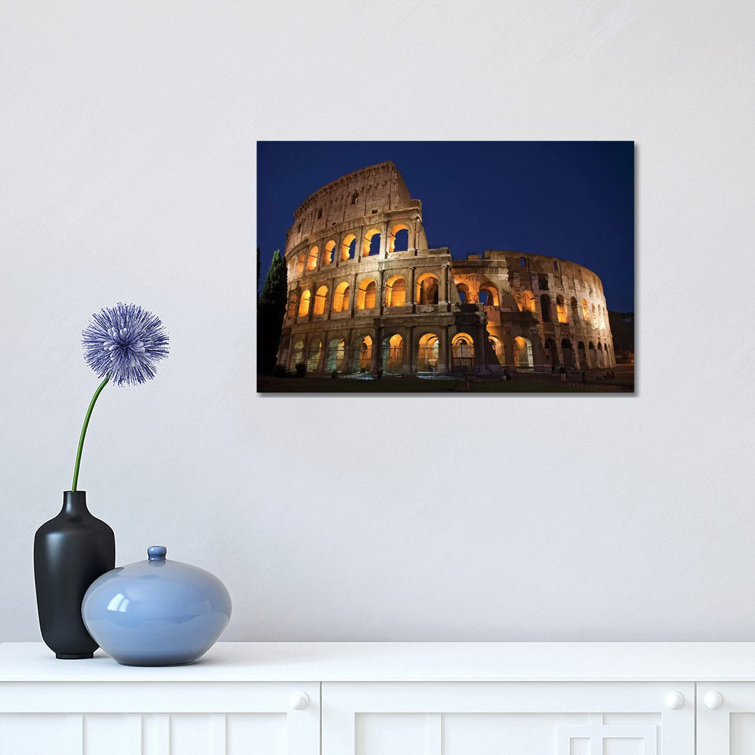 Italy, Rome, Colosseum. Night Scene At Landmark. by Jaynes Gallery - Wrapped Canvas Print