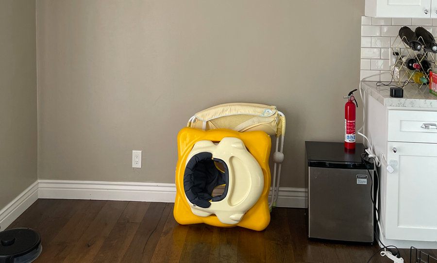 Folded baby bouncer.