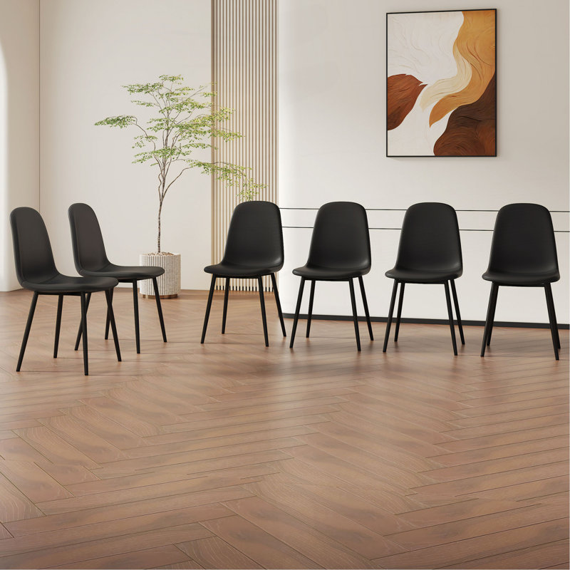 Ensemble de chaises de salle à manger modernes et minimalistes noires - six chaises par boîte, stables et confortables. Chaises d'appoint rembourrées de style Mid-Century moderne, chaises en forme de cuillère avec pieds en métal noir.