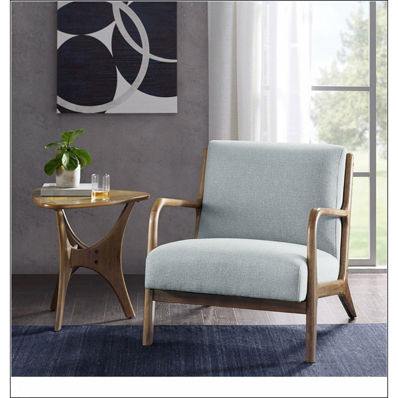 Chaise longue en polyester bleu clair à 4 pieds, parfaite pour lire, se reposer et recevoir des invités dans n'importe quel espace de vie.