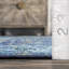 Tapis oriental bleu-1062465707