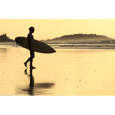 Surfer At Sunset On The Beach - Wrapped Canvas Print