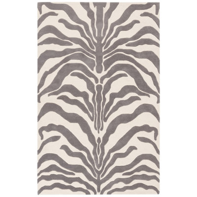 Carmaleta Hand Tufted Wool Pile Animal Print Rug
