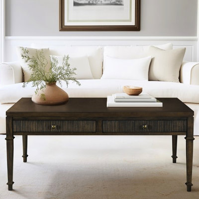 Table basse classique brun foncé avec rangement et pieds à 2 tiroirs