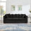 Canapé de salon moderne avec accoudoirs carrés décorés de clous argentés et revêtement en velours noir