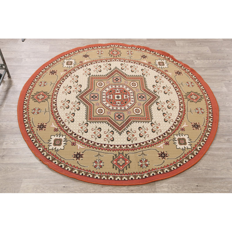 Tapis ivoire/rouge/brun rond oriental
