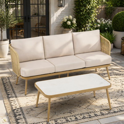 Ensemble de canapé et de table basse en rotin et osier d'extérieur toutes saisons pour le confort du patio, du jardin et de la cour