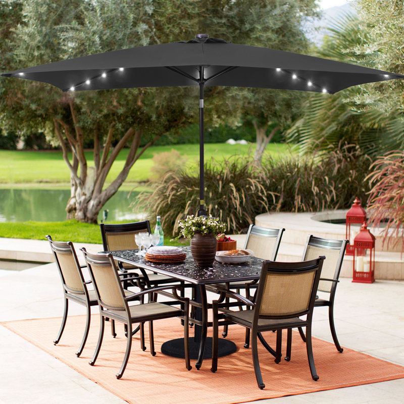 lighted patio umbrella free shipping Blissun 9 ft Solar 32 LED Umbrella Table Market Umbrella with Tilt and Crank Outdoor Umbrella for Garden, Deck, Backyard, Pool and Beach (Navy Blue) : Patio Featuring a convenient manual open Lucent 10' Cantilever Patio Umbrella