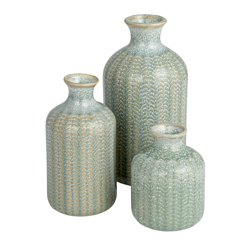 Vases en grès embossé avec glacis réactif