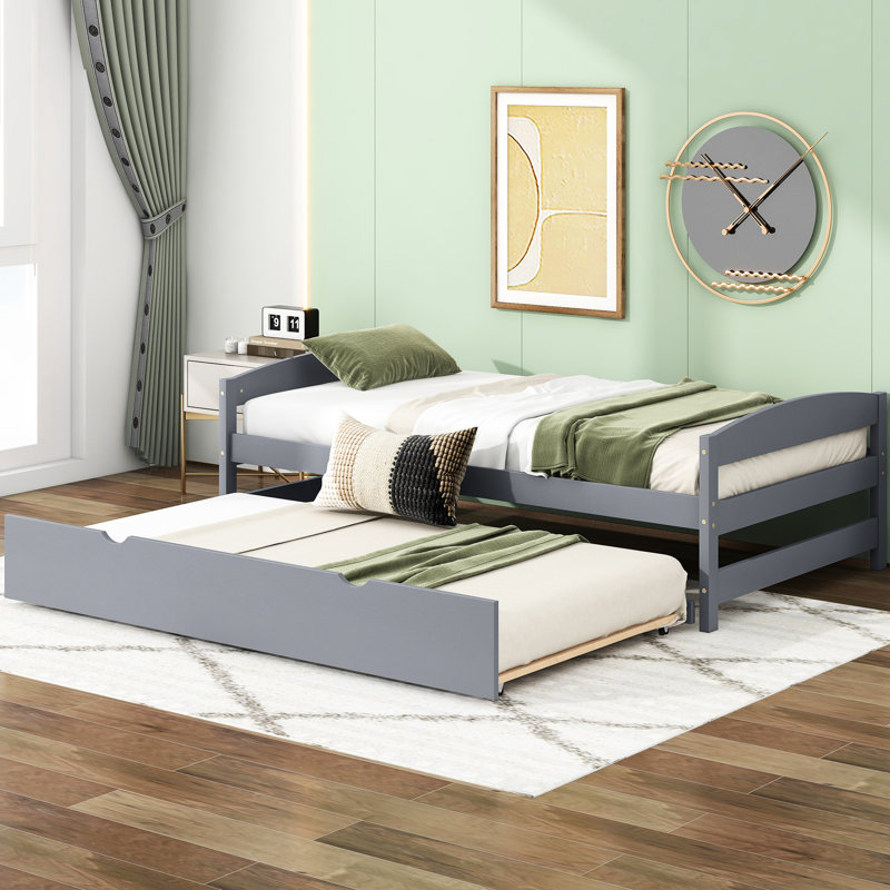 Lit plateforme simple avec lit gigogne gris - Aménagement fonctionnel de la chambre à coucher