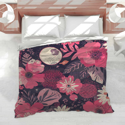 Édredon rose à motif floral