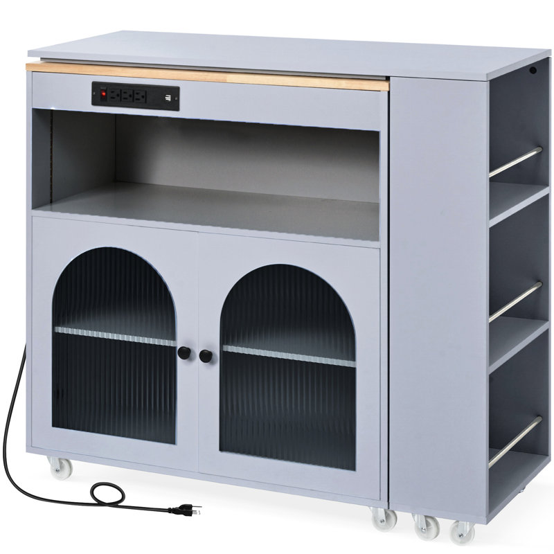 Îlot de cuisine sur roulettes avec table allongée, DEL, prise de courant, portes et fabrication en verre cannelé, table et rangement bleus, finition grise, lumières intégrées