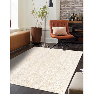 Tapis beige tressé à la main Carlotta