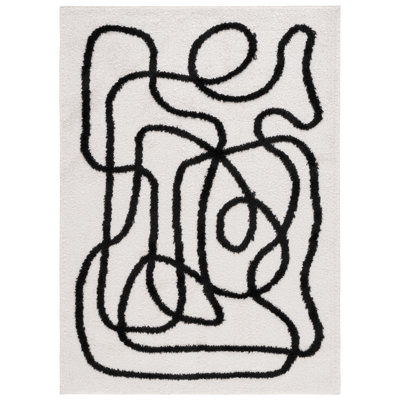 Darshini Geometric Area Rug