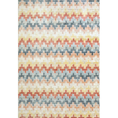 Tapis rouge / bleu / jaune à chevrons Pridbjorn