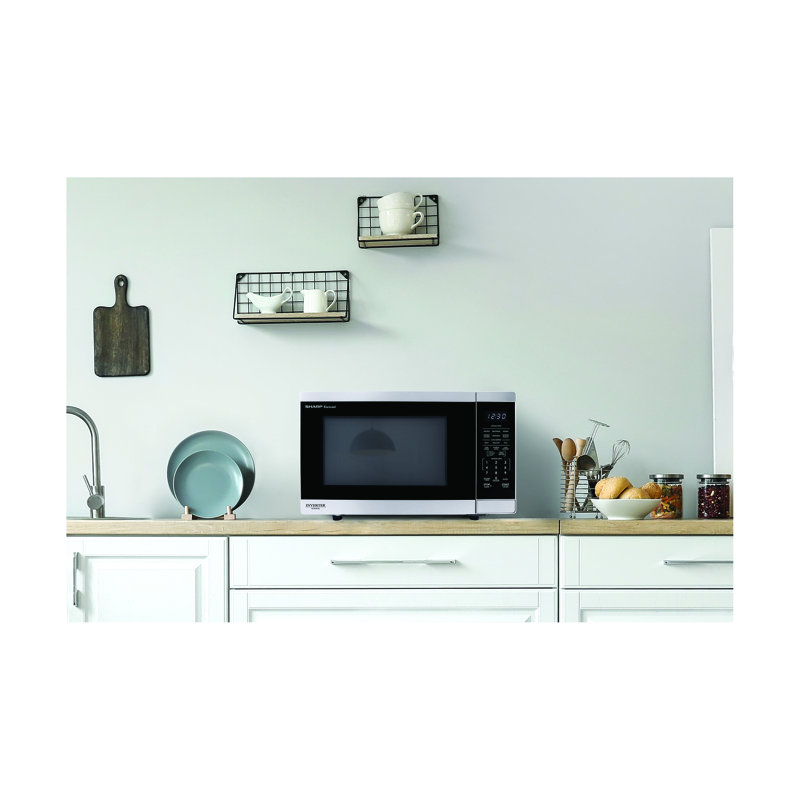Four à micro-ondes de comptoir Sharous SMC1464KSC Carousel®, technologie Inverseur, 1,4 pi³ pi., 1100 W, acier inoxydable, cuisson par capteur, conception compacte