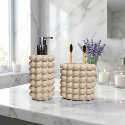 Ensemble d'accessoires de salle de bain texturé à bulles 2 pièces, distributeur de savon en résine et porte-brosse à dents pour salle de bain, chambre d'invité, appartement et dortoir Better Sand Nova Collection