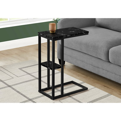 Table de chambre à coucher contemporaine avec surface rectangulaire en marbre noir et base en métal pour le salon