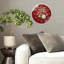 Horloge murale moderne en verre rouge à paillettes