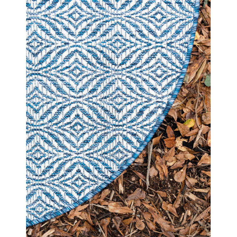 Tapis intérieur / extérieur bleu / ivoire Lithonia, Rond 4 pi 1 po