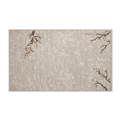 Tapis beige lavable à la machine