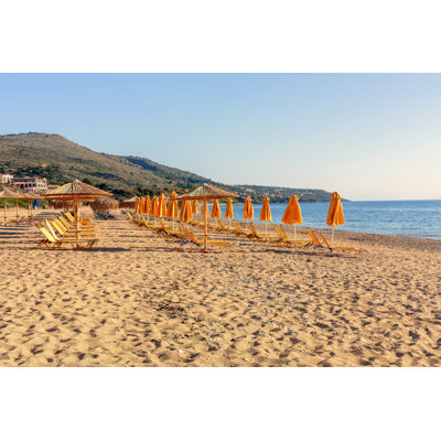 Orange parasols at skala beach