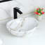 Lavabo de salle de bain en marbre blanc 16,3 "x 13,4" avec évier Pop Up