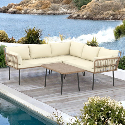 Forbell 4 Piece Rattan Sectional Seating Group with Cushions by Mistana