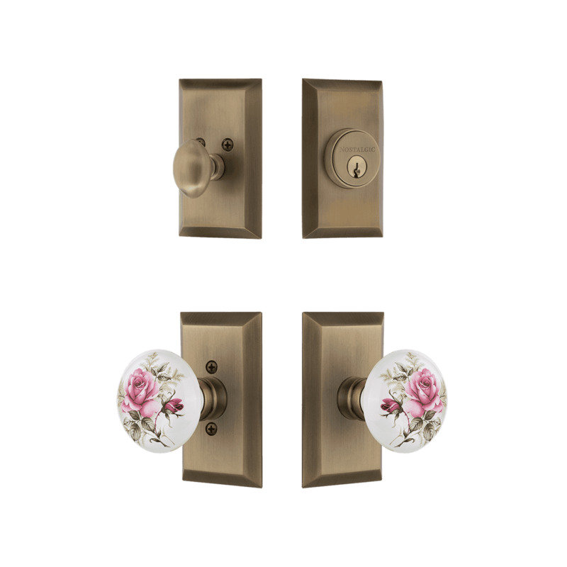 Ensemble d'entrée Nostalgic Warehouse Studio avec bouton en porcelaine rose blanche en laiton antique, Laiton antique