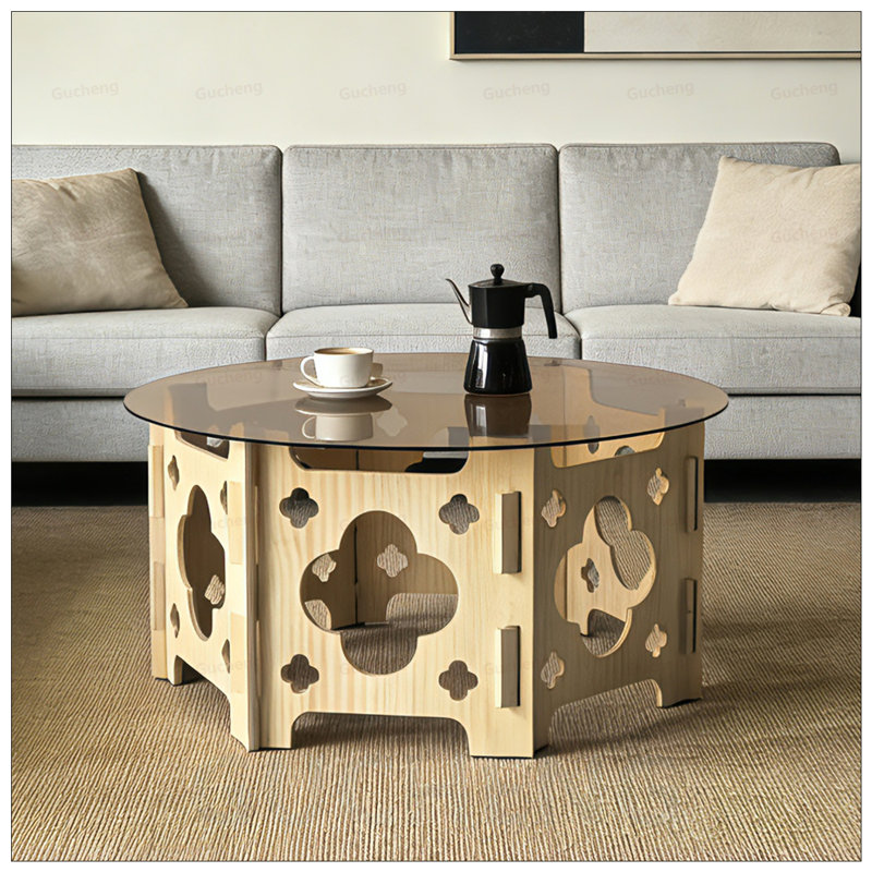 Table basse ronde en verre trempé avec sculpture creuse et nid de chat caché, élégante et peu encombrante