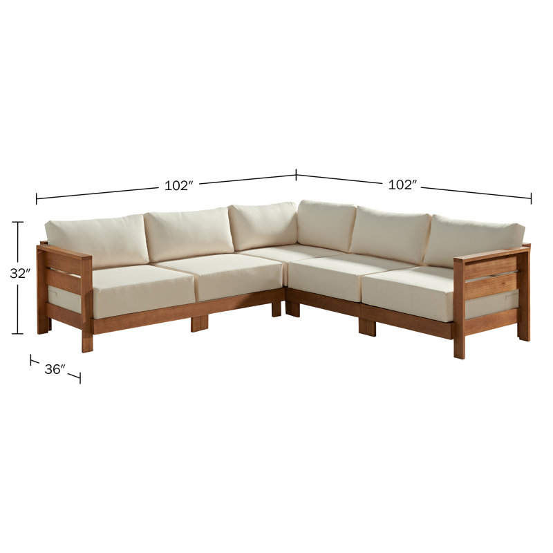 Table basse d'extérieur en L en bois massif de 102 po avec coussins crème Pomona