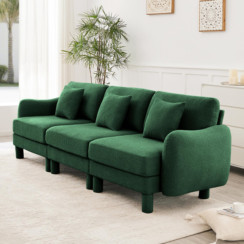 Sofa with unique shell-shaped armrests, Green